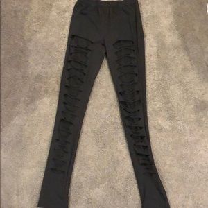 Black leggings w/ rips and mesh under. Size S
